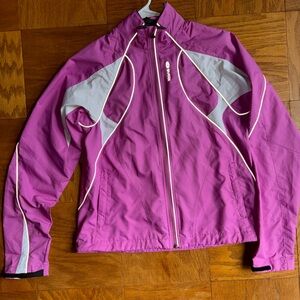 SUGOI Versa Jacket: Magenta Convertible Wind Jacket to Vest with magnetic straps